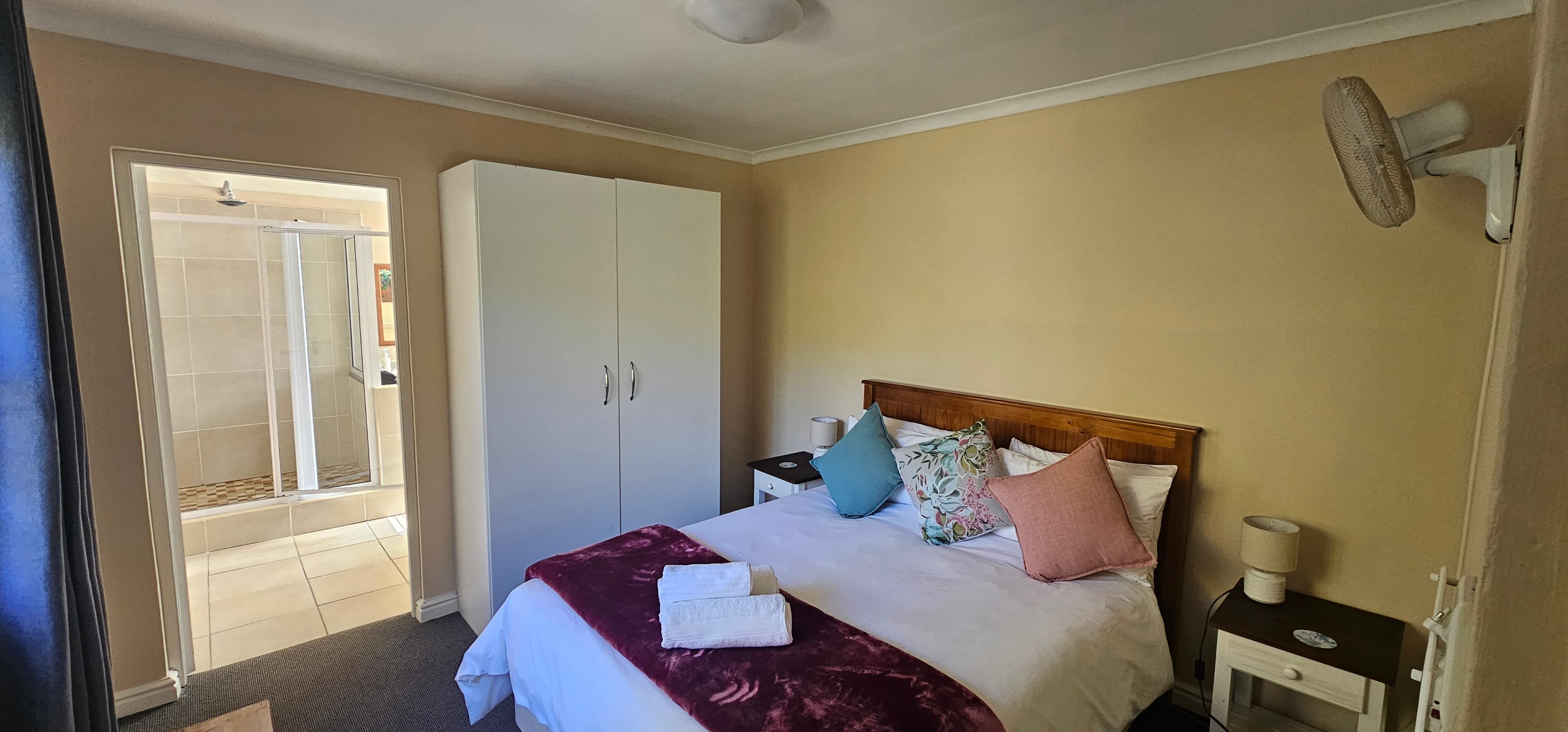 Main bedroom with double bed at Little Louisa guest house